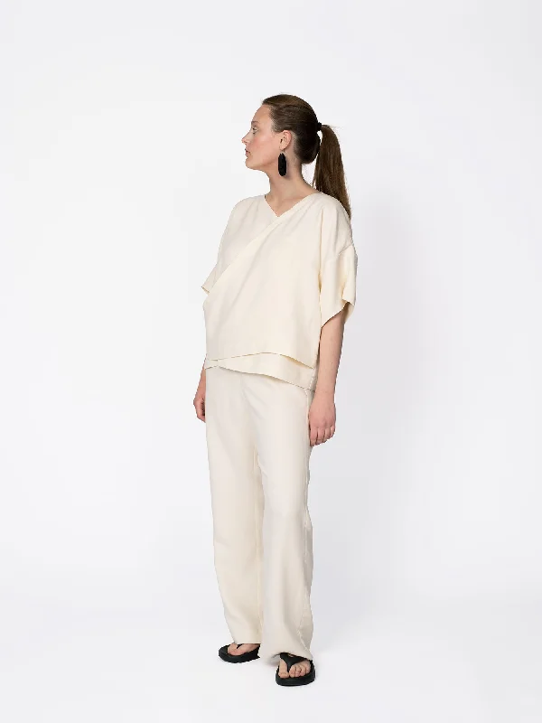 Limited Stock Available!The Assembly Line Wrap Top